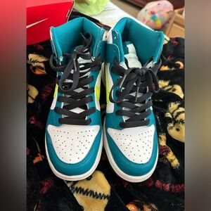 Teal and neon green Nike dunks